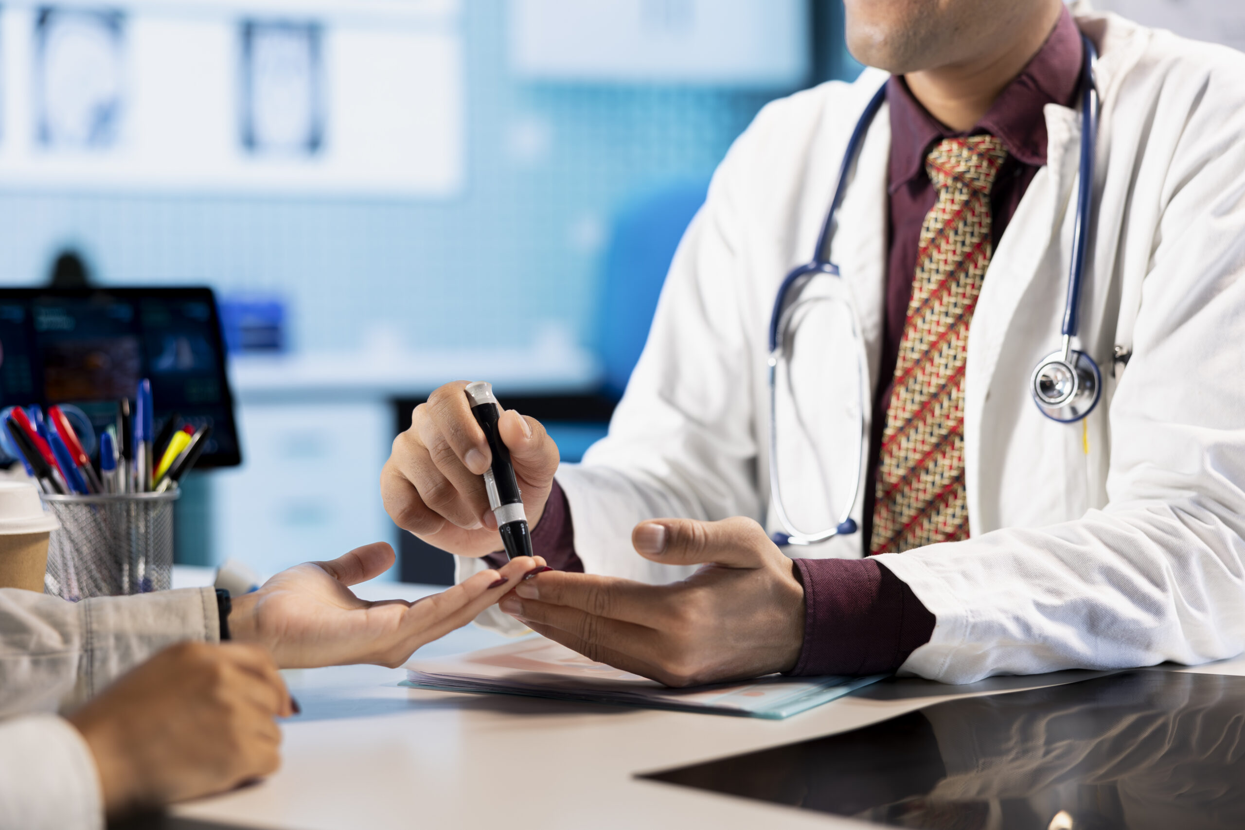 Doctor checking patient blood sugar | Worldwide medical services UK