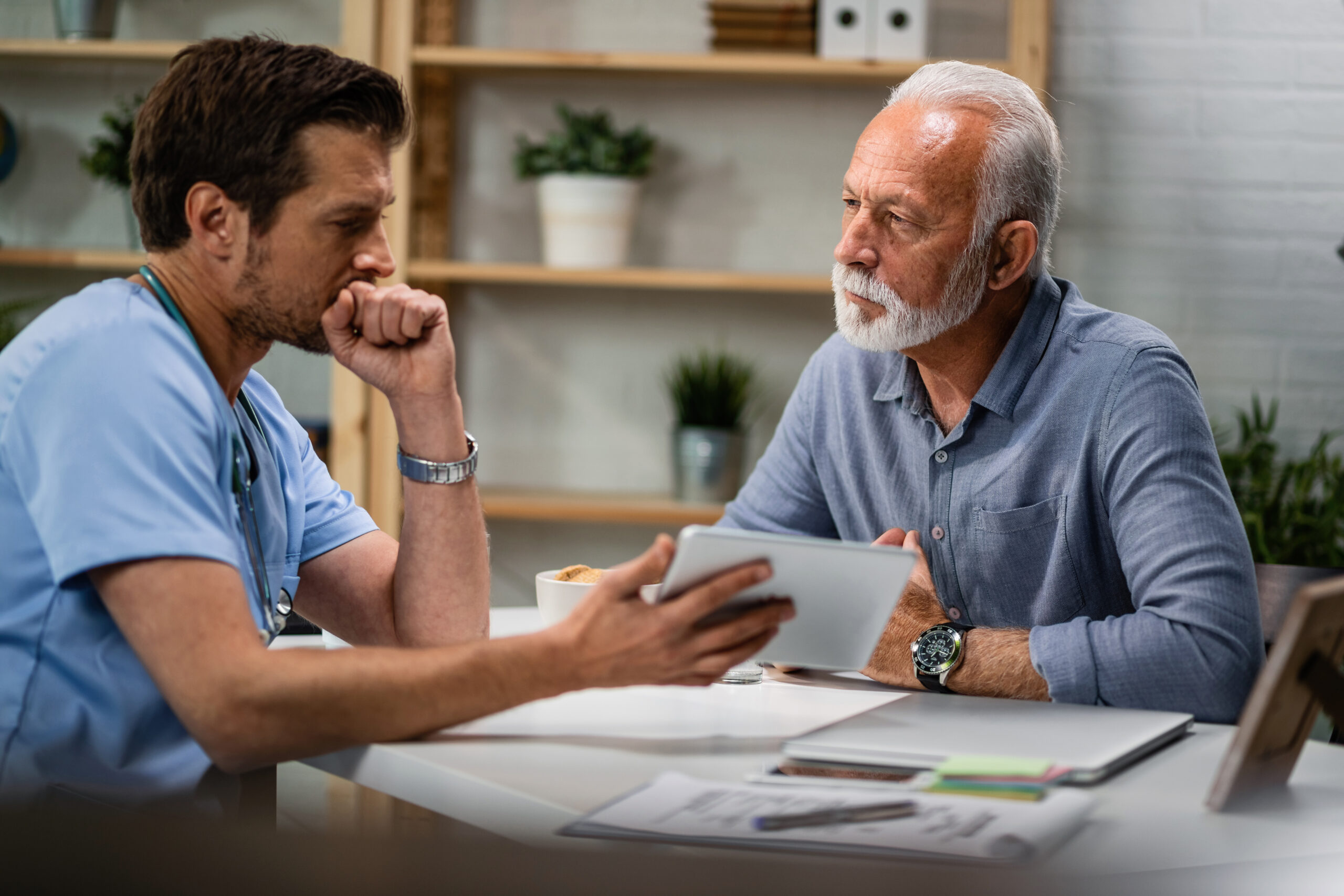 Doctor discussing results with patient | Worldwide medical services UK